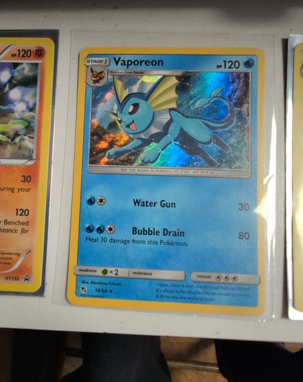 2019 Pokémon Hidden Fates #18 Vaporeon — front