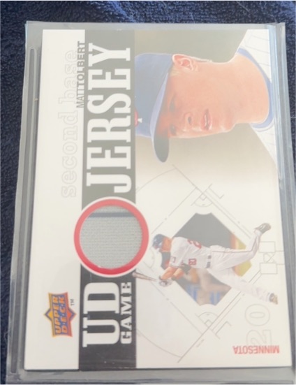 2010 Upper Deck UD Game Jersey #UDGJ-JU Justin Morneau — front