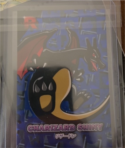 2025 Pokemon Team Rocket Shiny Charizard #4 — front