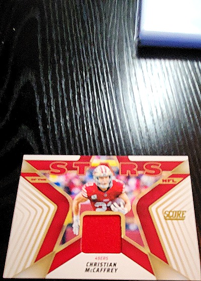 2025 Panini Score Stars of the NFL #SNJ-CMY Christian McCaffrey — front