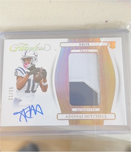 2023 Panini Flawless #21 Adonai Mitchell — front
