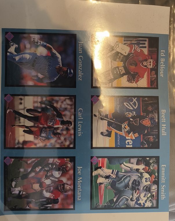 1991 Tuff Stuff Sports Magazine Uncut Sheet Joe Montana, Emmitt Smith, Brett Hull, Ed Belfour, Juan Gonzalez, Carl Lewis — front