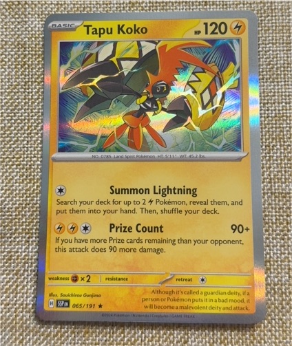 2022 Pokémon SV08: Surging Sparks #065 Tapu Koko — front