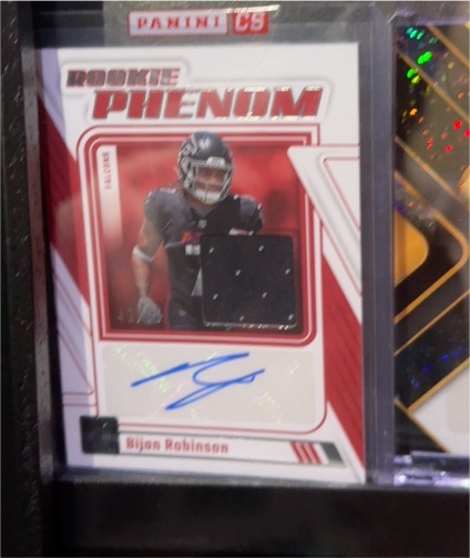 2023 Panini Donruss Rookie Phenom Jerseys #RPJA-BROB Bijan Robinson Auto — front