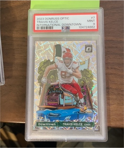2023 Donruss Optic #7 Travis Kelce International Downtown — front