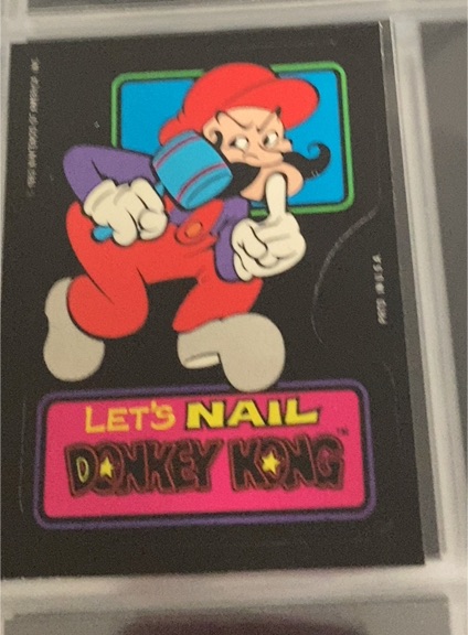 1982 Topps Nintendo #14 Let's Nail Donkey Kong Mario — front