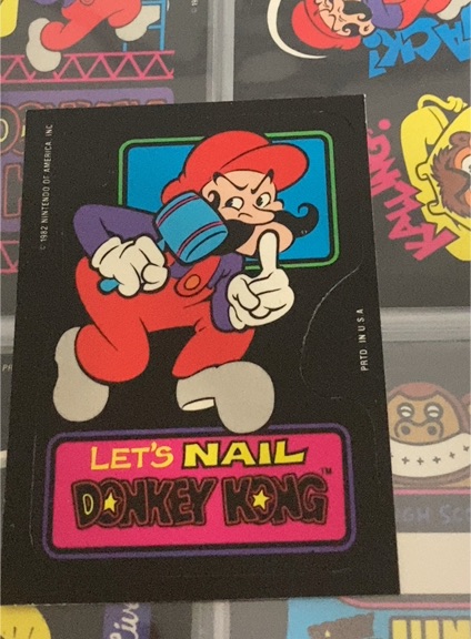 1982 Topps Nintendo Let's Nail Donkey Kong Sticker Card — front