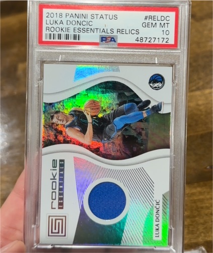 2018 Panini Status #RELDC Luka Doncic Rookie Essentials Relics — front