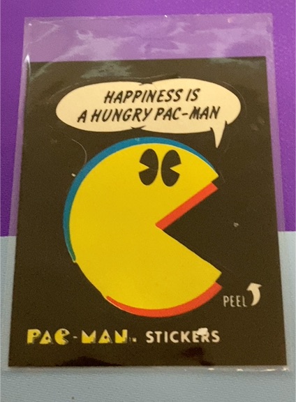 1980 Fleer #51 Pac-Man Sticker Happiness is a hungry Pac-man — front