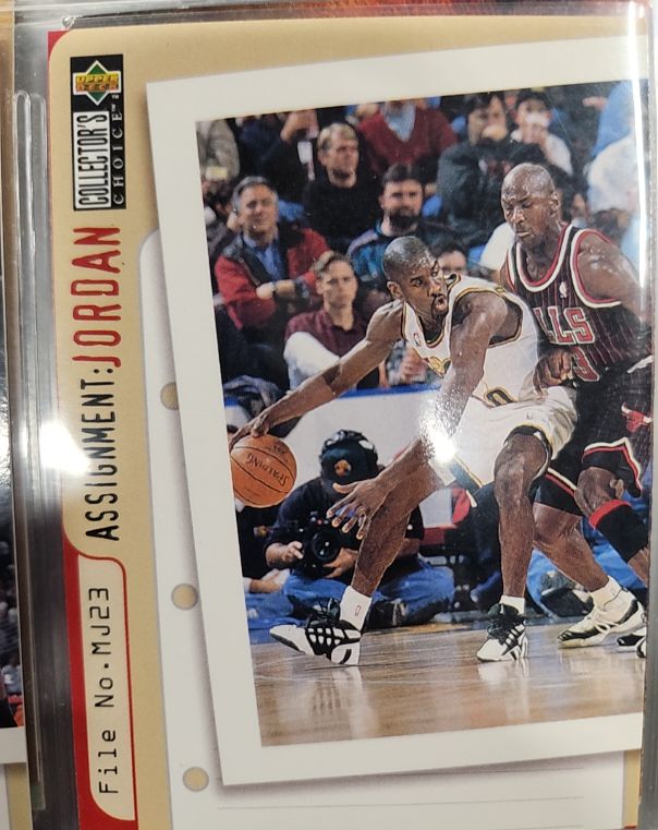 1996 Upper Deck Collector's Choice Assignment: Jordan #MJ23 Michael Jordan — front