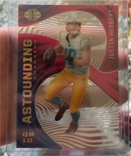 2020 Panini Illusions #A3 Justin Herbert Astounding Rookie Card — front