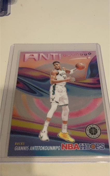 2023-24 Panini NBA Hoops Premium Stock #12 Giannis Antetokounmpo Anti Gravity Silver Prizm — front
