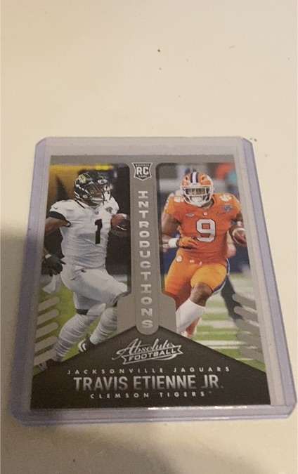 2021 Panini Absolute Introductions #INT-12 Travis Etienne Jr. — front