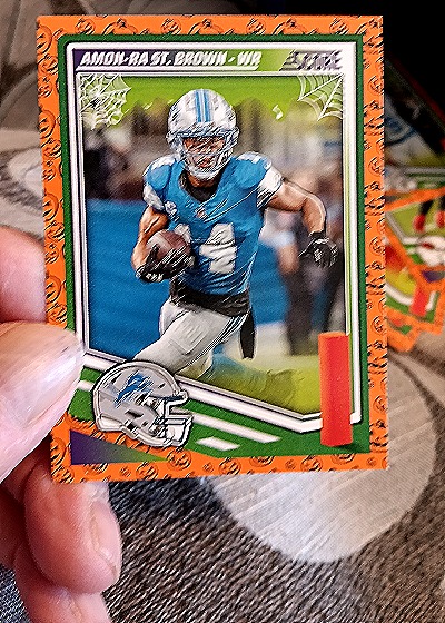2025 Panini Score-A-Treat #142 Amon-Ra St. Brown — front