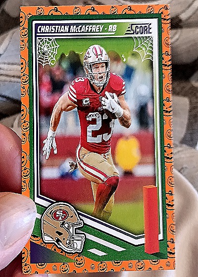 2025 Panini Score-A-Treat #238 Christian McCaffrey — front
