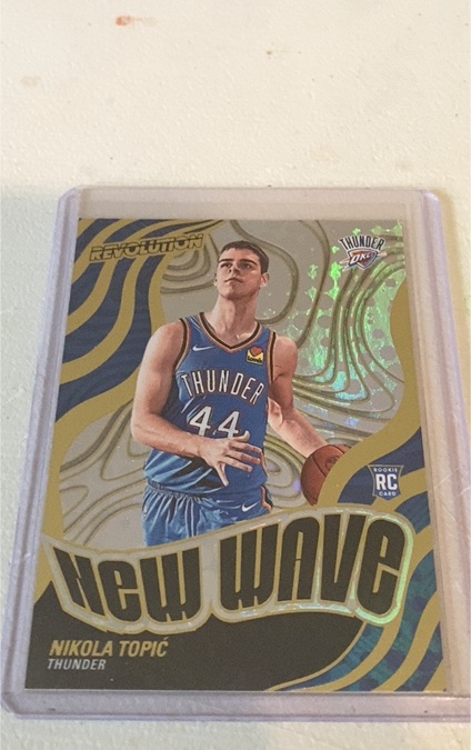 2024-25 Panini Revolution #22 Nikola Topic New Wave RC — front