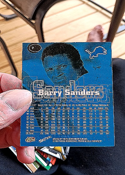 1997 SkyBox Premium #7 Barry Sanders — back