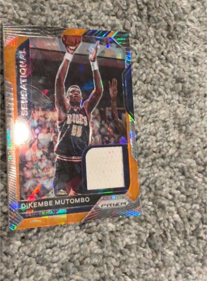 2020-21 Panini Prizm Sensational Swatches #SSW-DMU Dikembe Mutombo — front