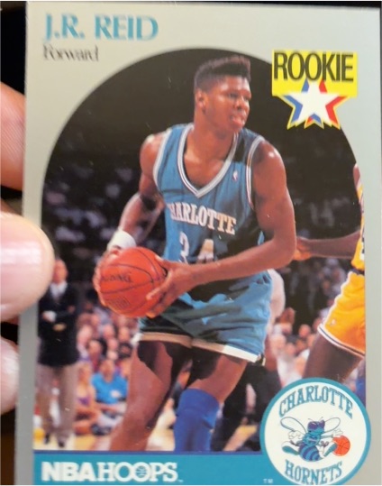1990 Hoops #57 J.R. Reid — front