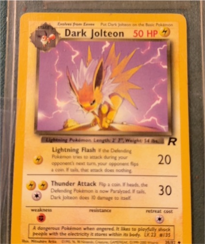 2000 Team Rocket #38 Dark Jolteon — front