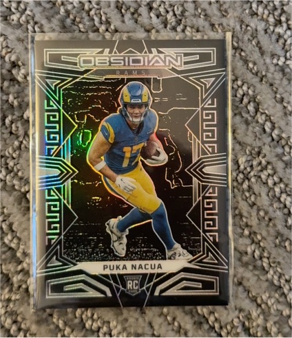 2023 Panini Obsidian #156 Puka Nacua — front