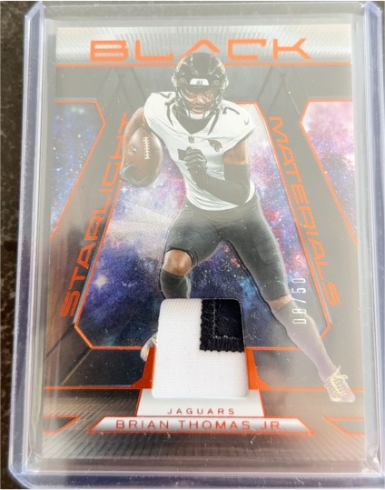 2025 Panini Black Starlight Materials #SMA-BTH Brian Thomas Jr. — front