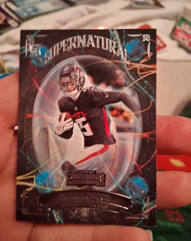2022 Panini Contenders - Supernatural #SN-DLO Drake London — front