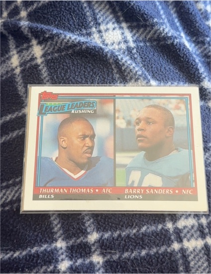 1991 Topps #9 League Leaders Rushing Thurman Thomas/Barry Sanders — front