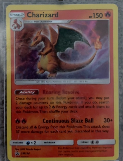 2019 Pokemon SM226 Charizard Black Star Promo — front