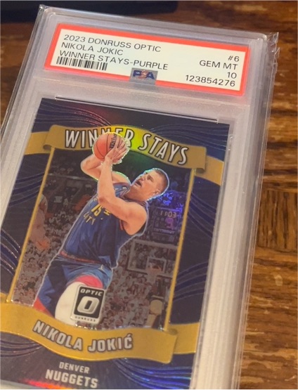 2023 Donruss Optic #6 Nikola Jokić Winner Stays Purple Prizm — front