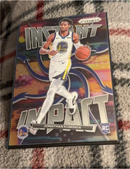 2021-22 Panini Prizm Instant Impact #7 Jonathan Kuminga — front