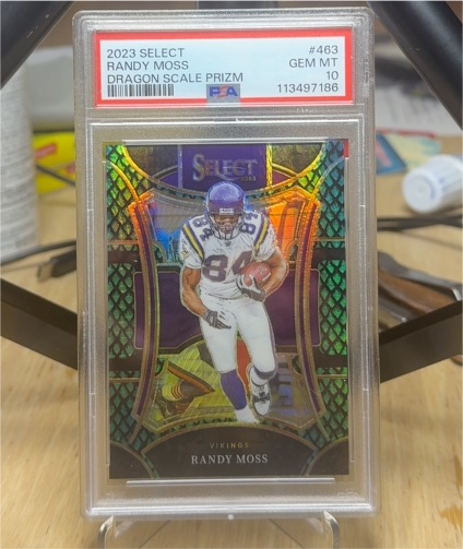 2023 Panini Select #463 Randy Moss Dragon Scale Prizm — front