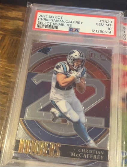 2021 Panini Select Numbers #SN20 Christian McCaffrey — front