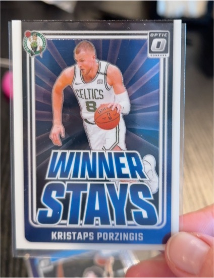 2024-25 Donruss Optic #9 Kristaps Porzingis Winner Stays — front