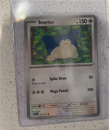 2024 Pokémon SV08: Surging Sparks #144 Snorlax — front