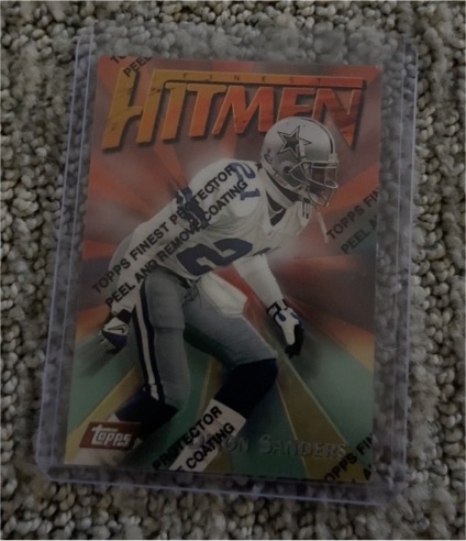 1997 Topps Finest Hitmen #90 Deion Sanders — front