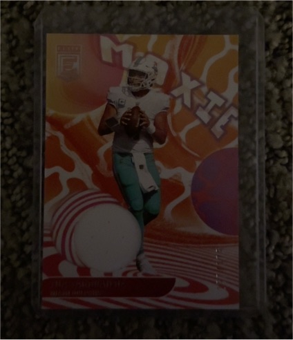 2023 Panini Donruss Elite Moxie Tua Tagovailoa — front