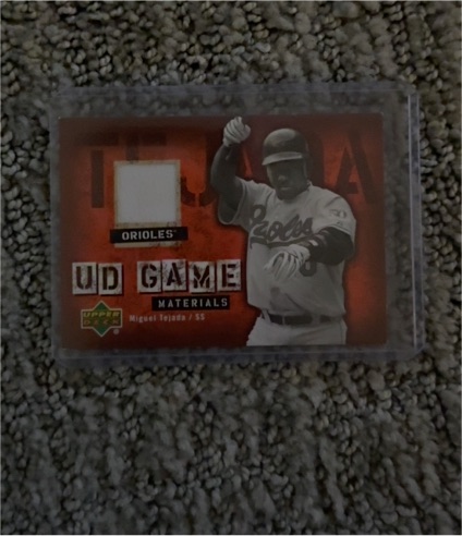 2006 Upper Deck UD Game Materials #UD-TE Miguel Tejada — front