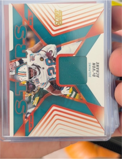 2025 Panini Score #SNJ-DAE De'Von Achane Stars Of The NFL Jersey Relic — front