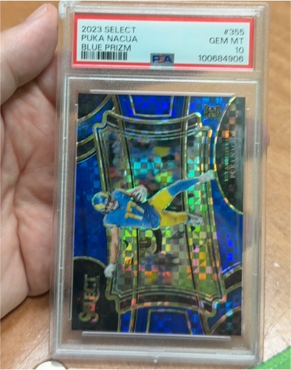 2023 Panini Select #355 Puka Nacua Blue Prizm — front