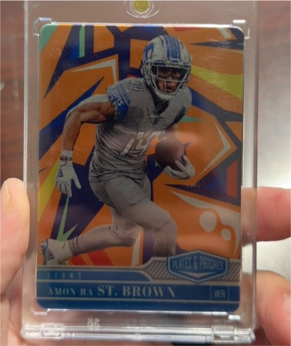 2023 Panini Plates & Patches #Amon Ra St. Brown — front