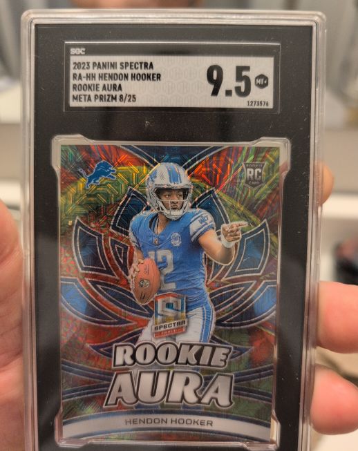 2023 Panini Spectra #RA-NH Hendon Hooker Rookie Aura Meta Prizm 8/25 — front