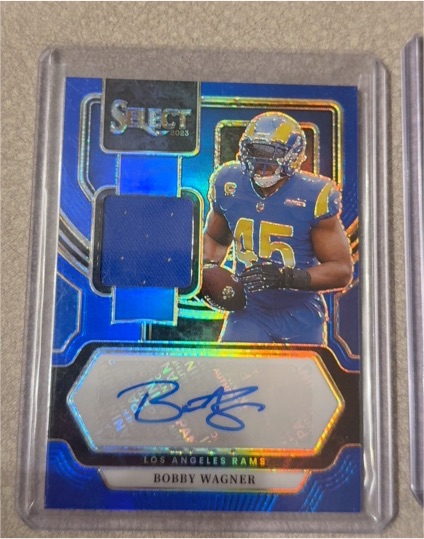 2023 Panini Select Bobby Wagner Signature Memorabilia Jersey Blue Prizm Auto — front