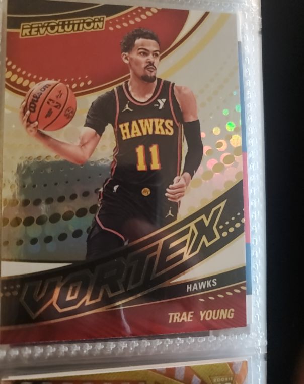 2024-25 Panini Revolution #11 Trae Young — front