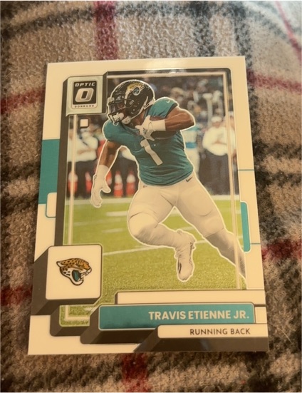 2022 Donruss Optic #90 Travis Etienne Jr. — front