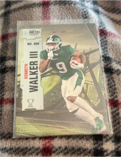 2022 Skybox Metal Universe Champions #058 Kenneth Walker III — front