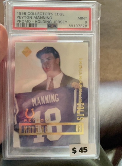 1998 Collector's Edge #NNO Peyton Manning Promo Holding Jersey — front