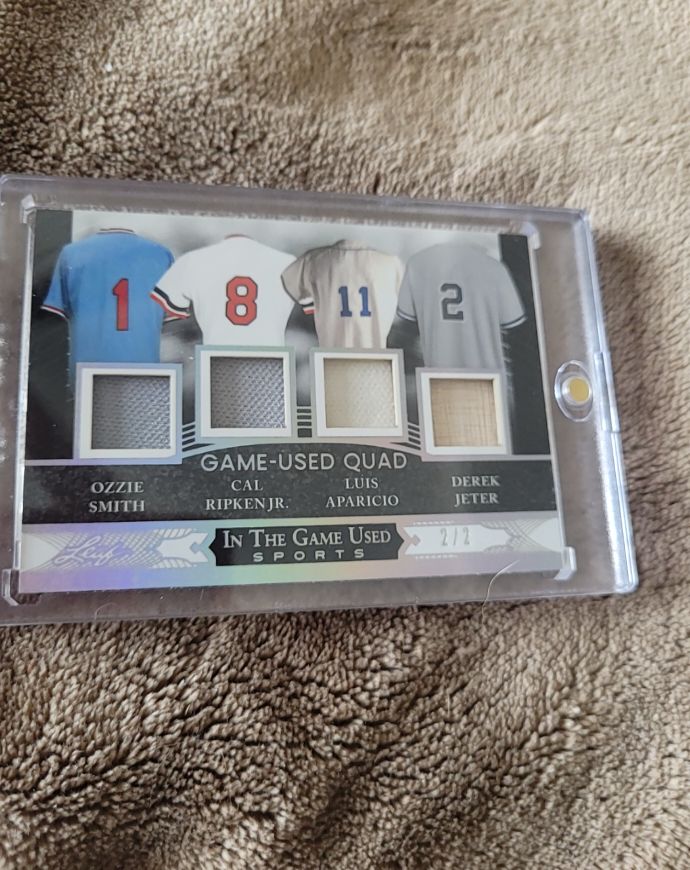 2024 Leaf In The Game Used Quad # Ozzie Smith, Cal Ripken Jr., Luis Aparicio, Derek Jeter — front