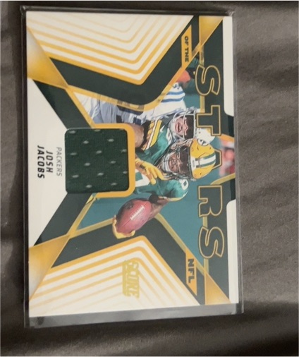 2025 Panini Score #SNJ-JJS Josh Jacobs Stars of the NFL Jersey Patch — front