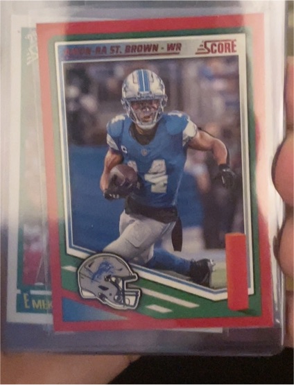 2025 Panini Score #142 Amon-Ra St. Brown — front